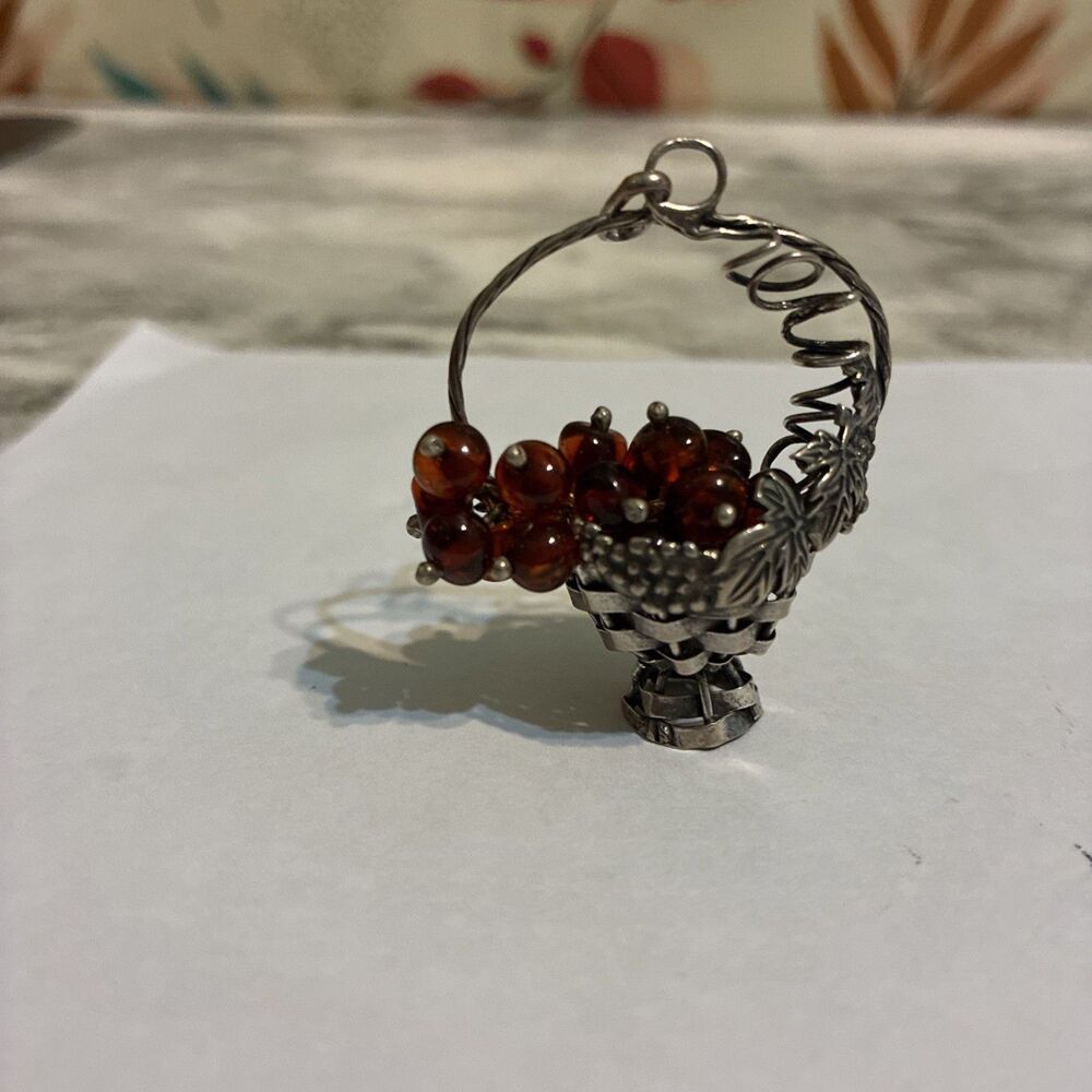 Antique amber-on-sterling silver pendant, "Basket of grape"
